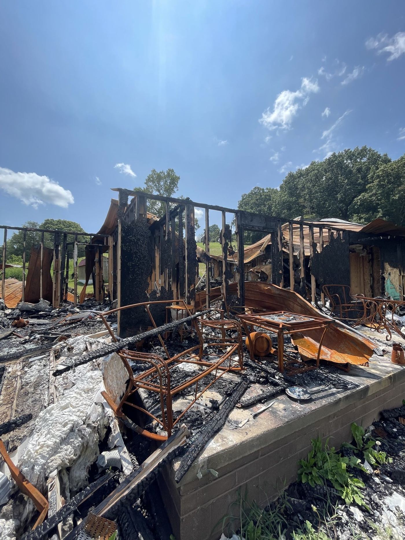 Fire-damaged structure teardown